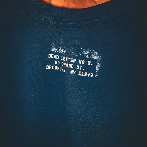 Dead Letter Number Nine Delivery Log Tee