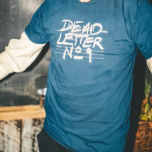 Dead Letter Number Nine Delivery Log Tee